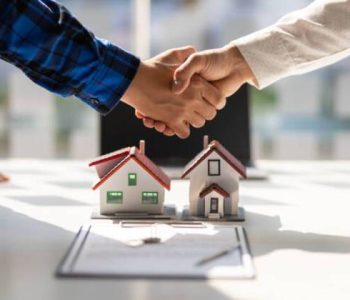 https-media-gettyimages-com-id-1409298953-photo-real-estate-agents-shake-hands-after-the-signing-of-the-contract-agreement-is-complete